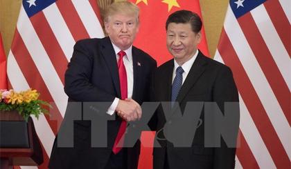 Tổng thống Mỹ Donald Trump (trái) và Chủ tịch Trung Quốc Tập Cận Bình tại Đại lễ đường Nhân dân ở Bắc Kinh. Nguồn: AFP/TTXVN