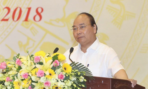 Prime Minister Nguyen Xuan Phuc addresses the meeting (Photo: VNA)