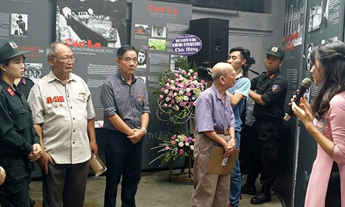 Visitors to an exhibition at Hoa Lo Prison Museum in Hanoi