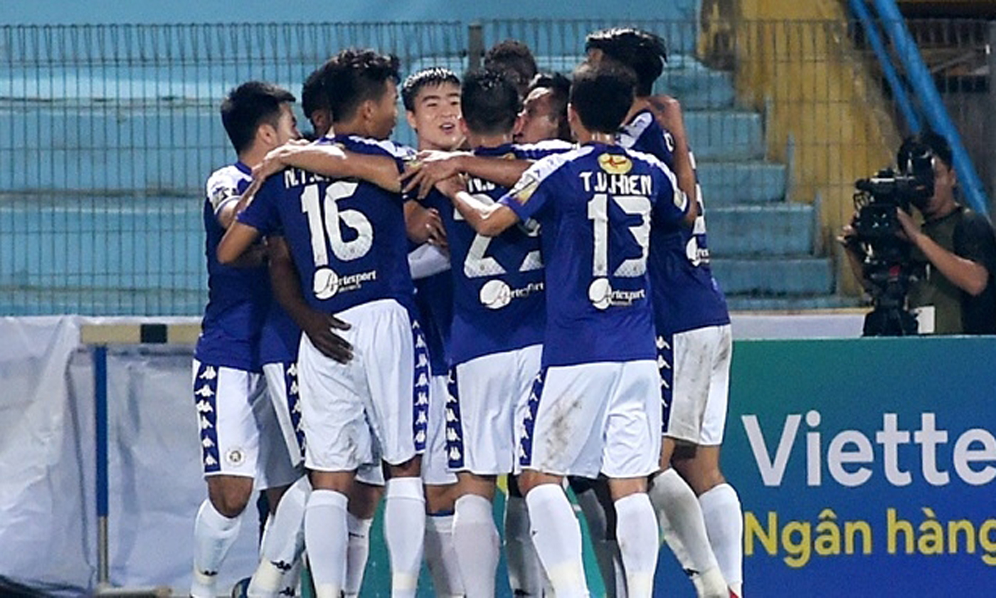   Hanoi FC players celebrate a goal against Viettel FC. (Photo: NDO/Tran Hai)