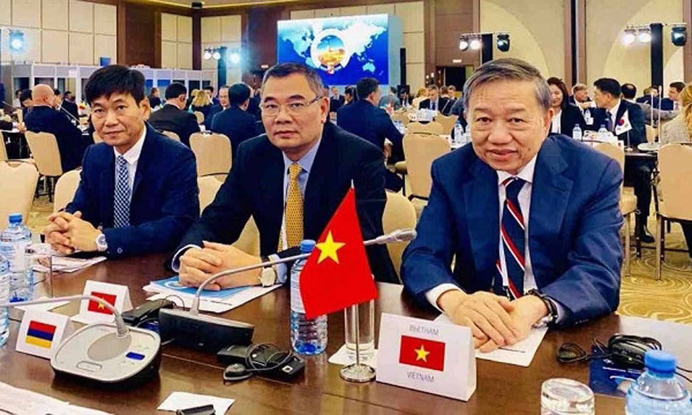  Minister of Public Security General To Lam (far right) at the event. (Photo: NDO/Nam Dong)