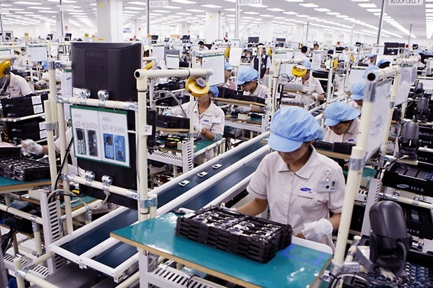 Workers at a manufacturing factory of electronic products in Vietnam.