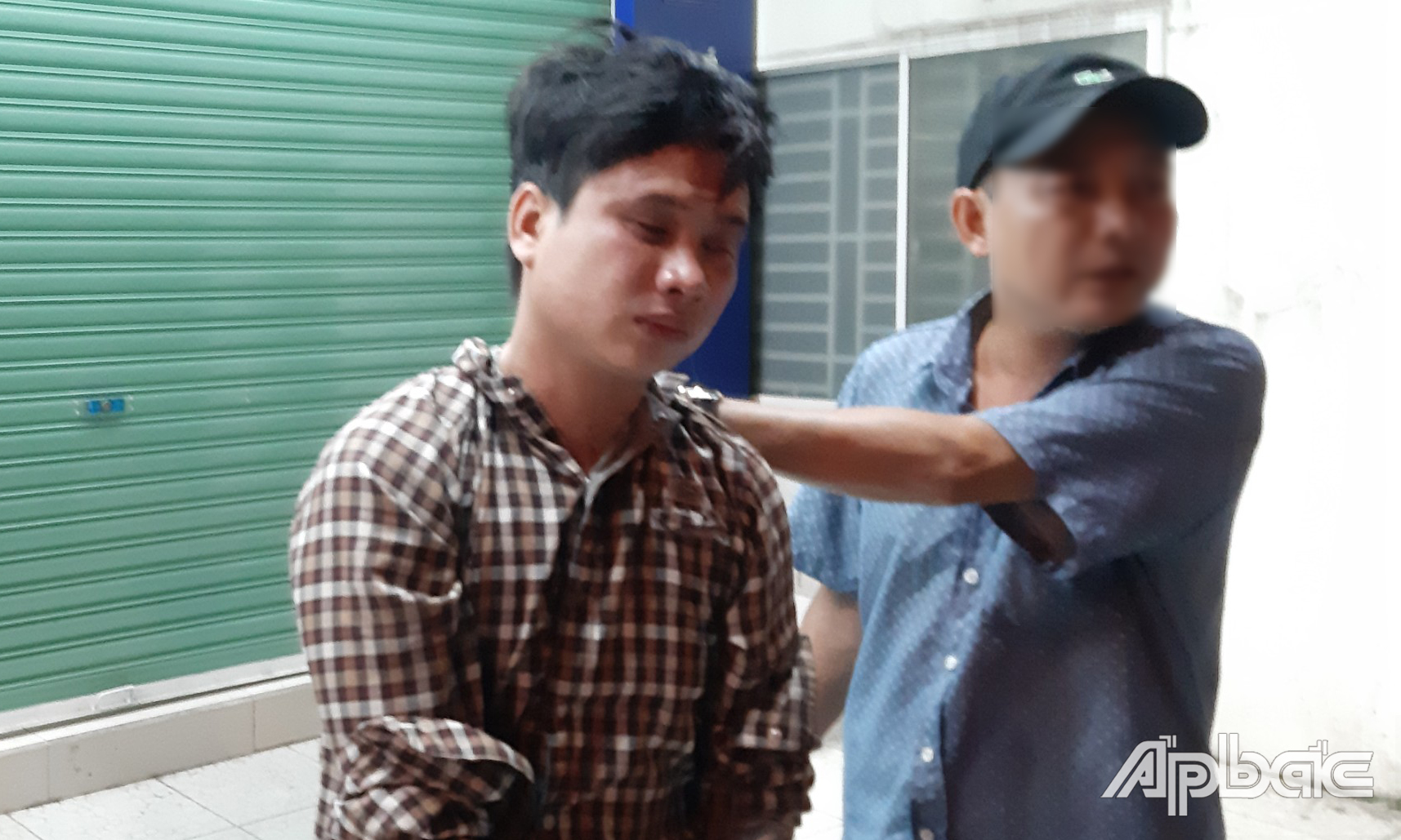 Việt lúc bị bắt giữ.