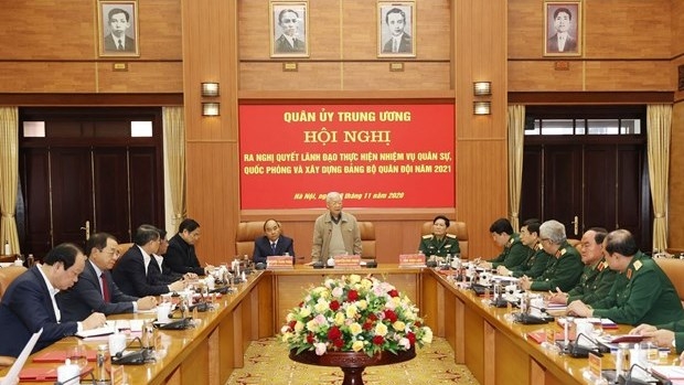 Party General Secretary and State President Nguyen Phu Trong (standing) addresses the meeting of the Central Military Commission on November 30 (Photo: VNA).