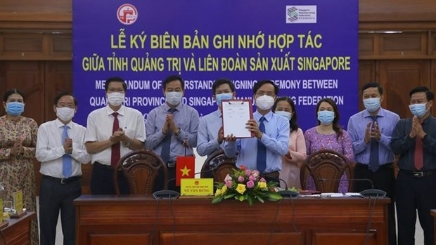 At the signing ceremony (Photo: laodong.vn).