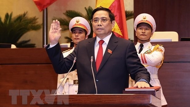 Prime Minister Pham Minh Chinh swears in on July 26. (Photo: VNA).