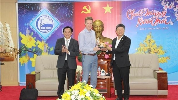 Binh Duong leaders have a working session with LEGO Vice President Preben Elnef (centre) on January 17 (Photo: VNA).