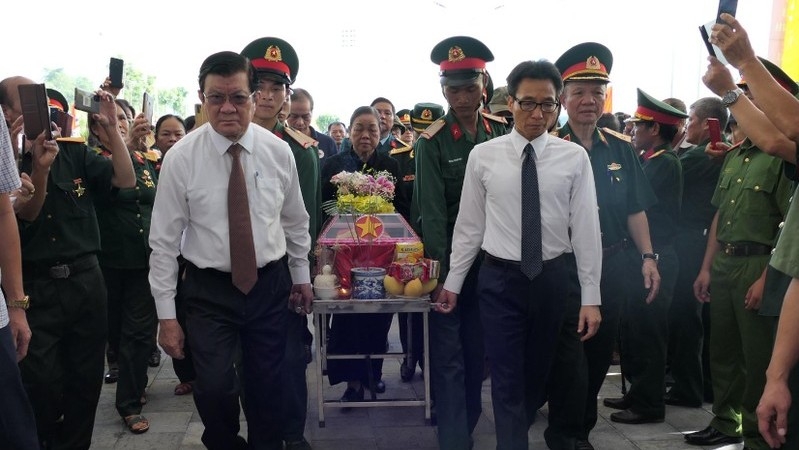 Former President Truong Tan Sang and Deputy PM Vu Duc Dam at the ceremony.