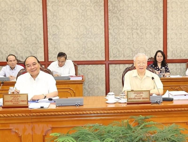 Party General Secretary Nguyen Phu Trong and President Nguyen Xuan Phuc at the meeting (Photo: VNA).