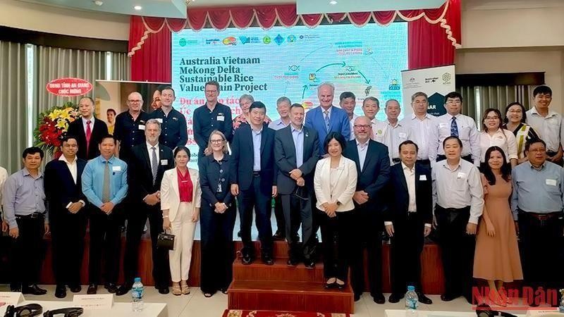 Delegates pose for a group photo at the launch ceremony.