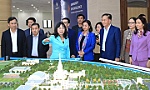 Lao Party officials visit Hanoi craft village, university