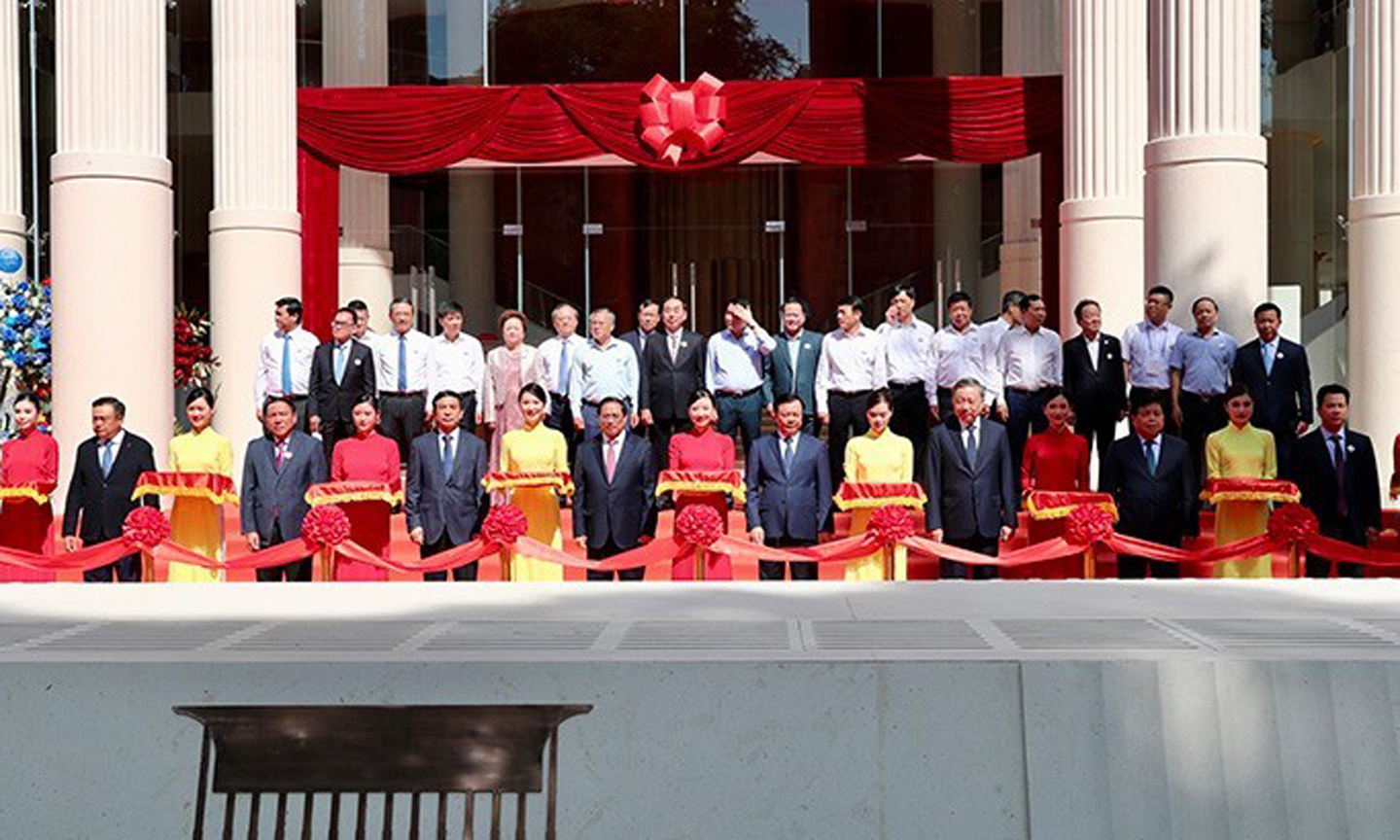 PM Pham Minh Chinh (front, centre) and officials cut the ribbon to open the Ho Guom Opera in Hanoi on July 9. (Photo: Nam Nguyen).