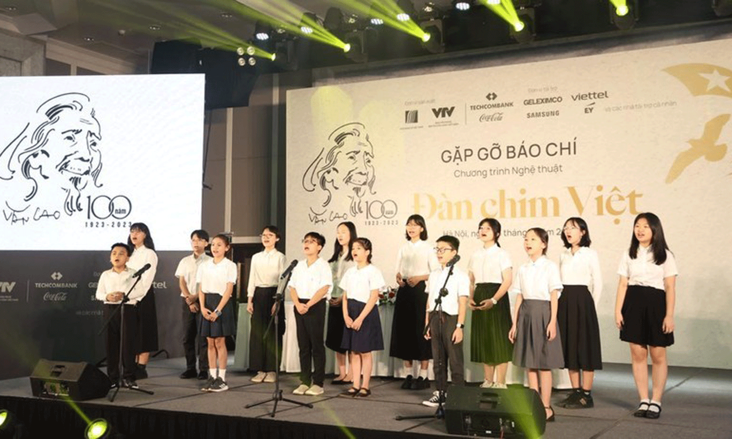 A children’s choir perform a song by Van Cao at the press conference.