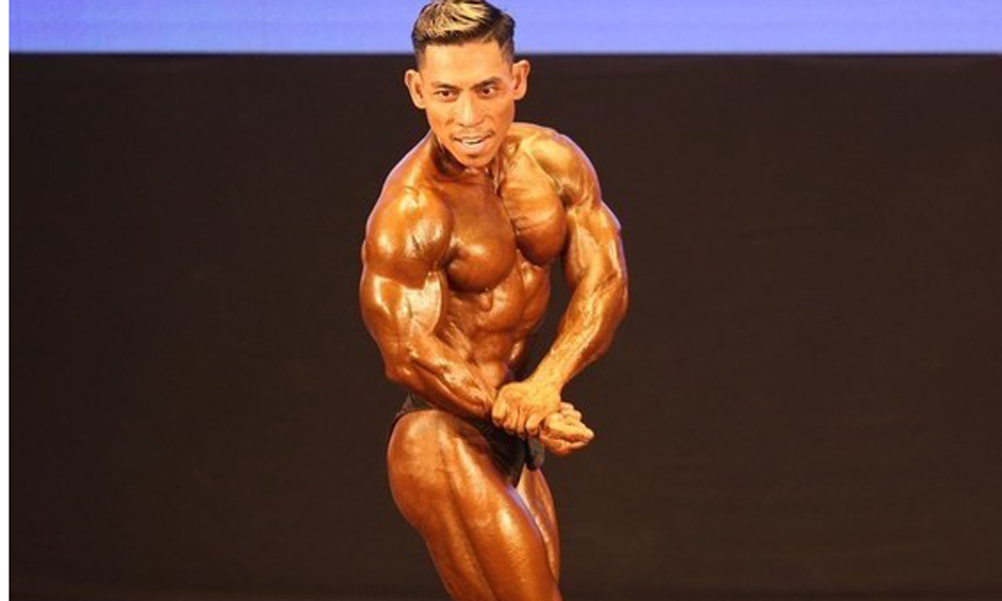 Pham Van Mach wins gold at the 14th WBPF World Bodybuilding and Physique Sports Championships & Congress on November 9. (Photo courtesy of the organisers).