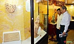 Antiques with dragon images displayed in HCM City