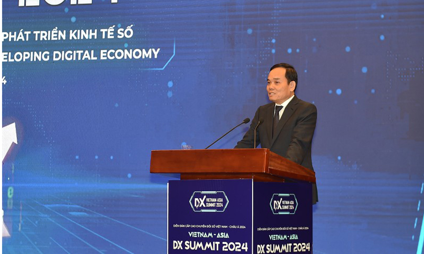 Deputy Prime Minister Tran Luu Quang speaking at the Vietnam - Asia Digital Transformation (DX) Summit 2024 (Photo: VGP).