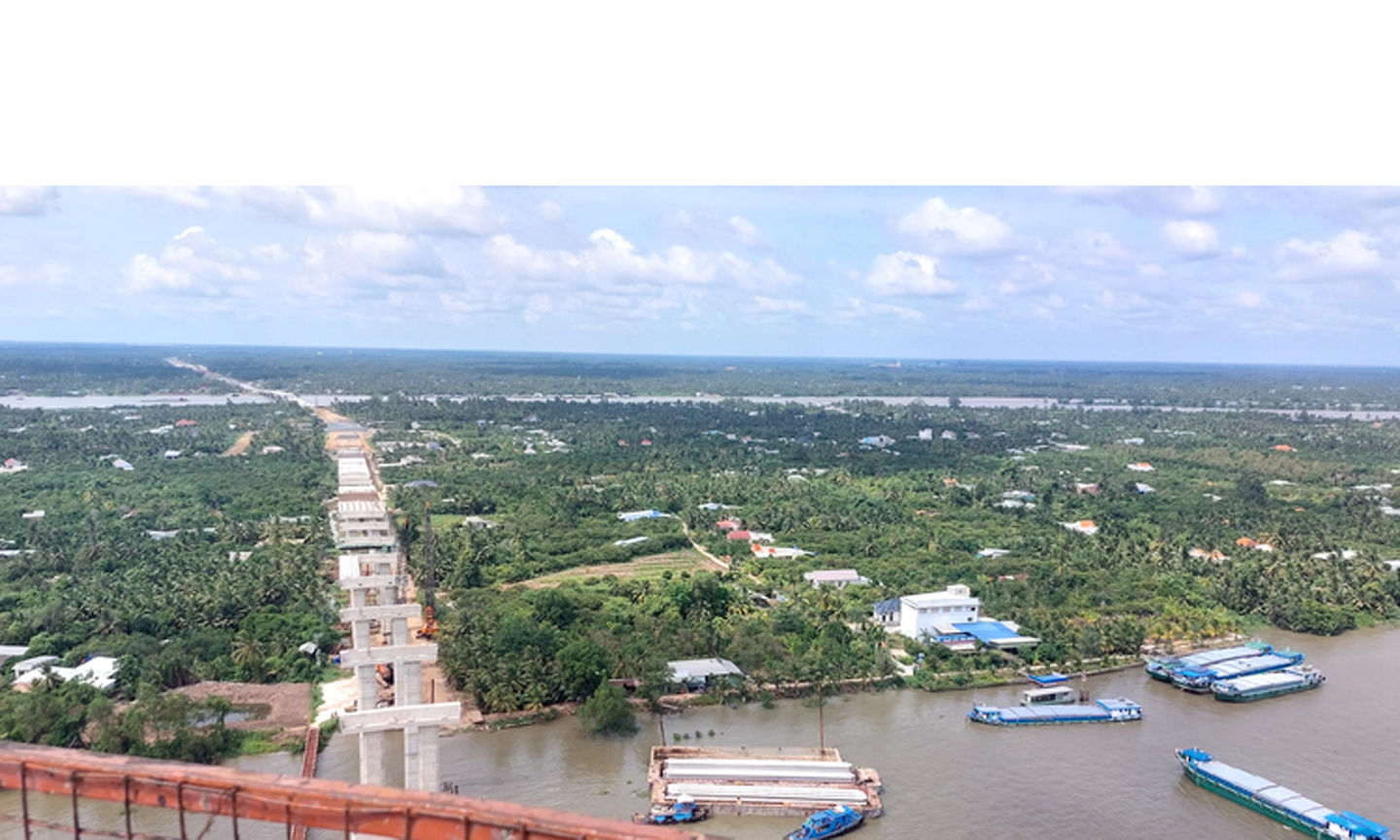 Nhìn từ trên cao, Dự án xây dựng cầu Rạch Miễu 2 đã nối dài một mạch từ tỉnh Tiền Giang đến tỉnh Bến Tre - Ảnh: VGP/Nhật Thy