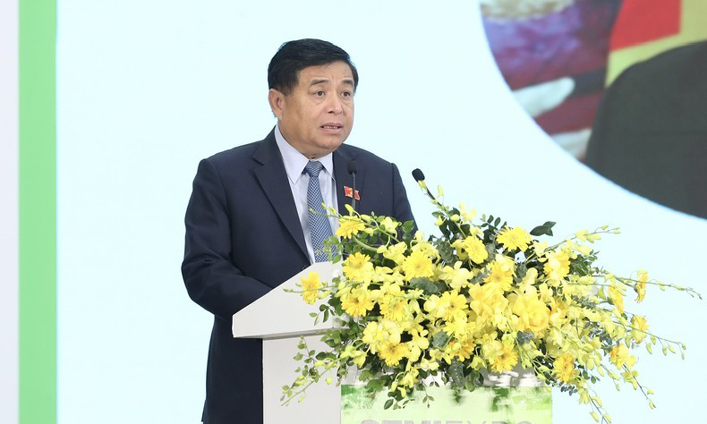 Minister of Planning and Investment Nguyen Chi Dung speaking at the opening ceremony.