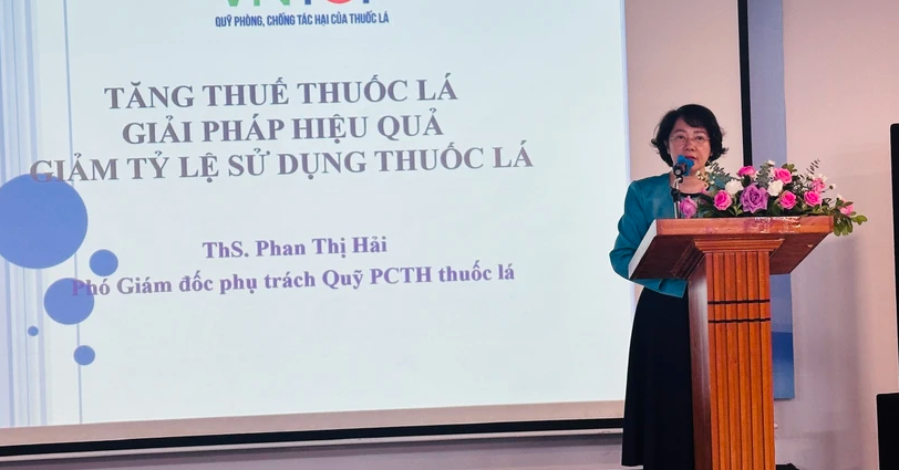 Bà Phan Thị Hải - Phó Giám đốc phụ trách Quỹ phòng, chống tác hại của thuốc lá (Bộ Y tế) phát biểu tại Hội nghị. (Ảnh: PV/Vietnam+)