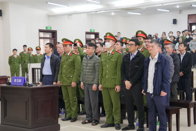 Các bị cáo trong vụ án tại phiên tòa phúc thẩm ngày 25-3 vừa qua. Ảnh: ĐỖ TRUNG